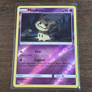 Pokemon TCG Mimikyu #58 Sun &Moon Guardians Rising Reverse Holo Rare Card 58/145